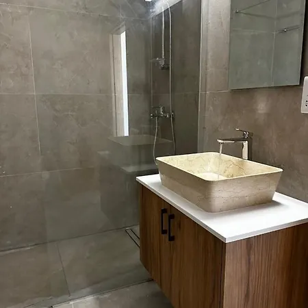 Stone Court Boutique Hotel de apartamente